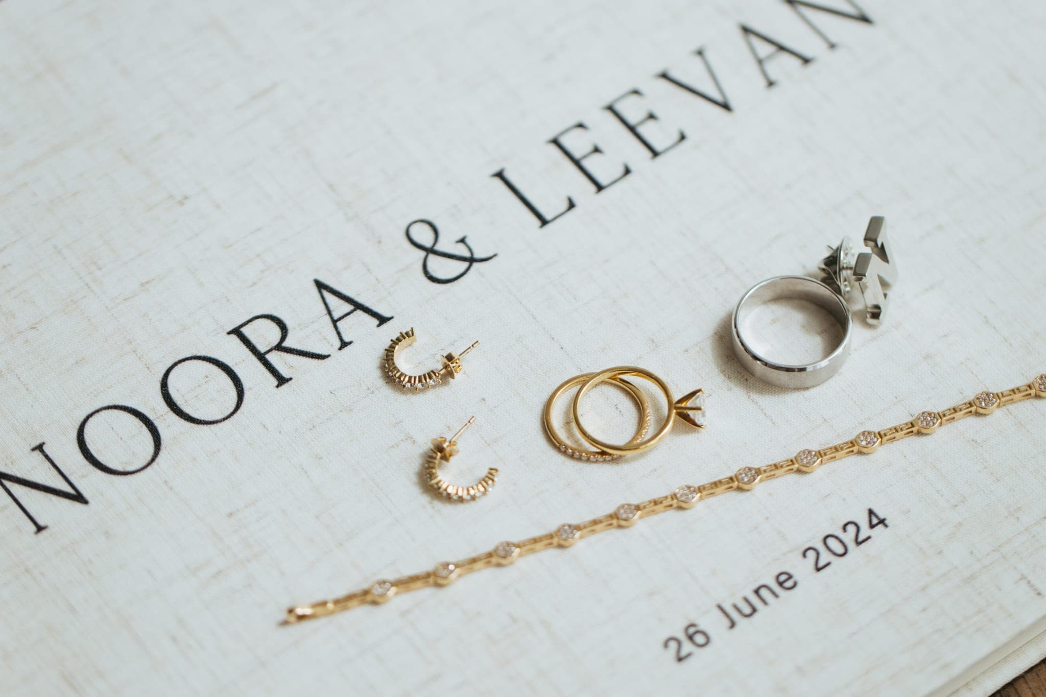Wedding rings and jewelry on Noora and Leevan album